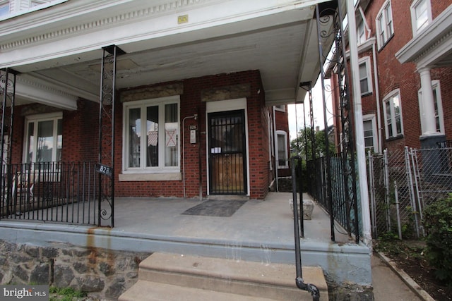 entrance to property with a porch