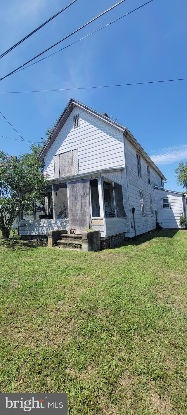 exterior space with a front yard