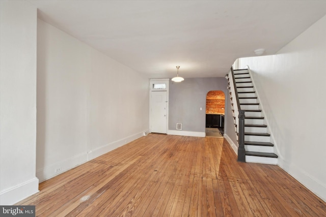 foyer entrance with hardwood / wood-style flooring