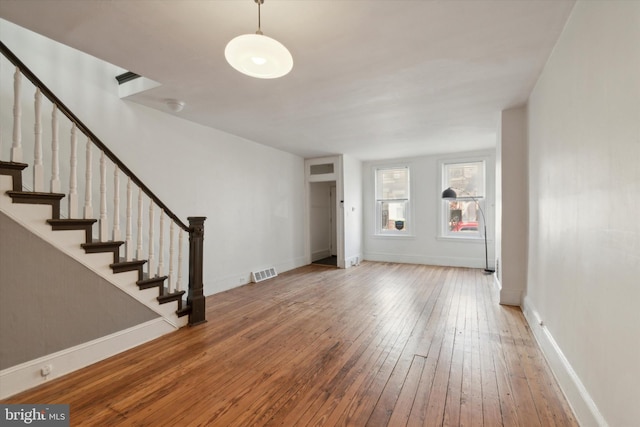 entrance foyer featuring wood-type flooring