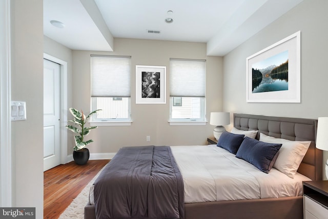 bedroom with wood-type flooring