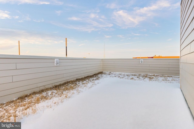 view of snowy yard