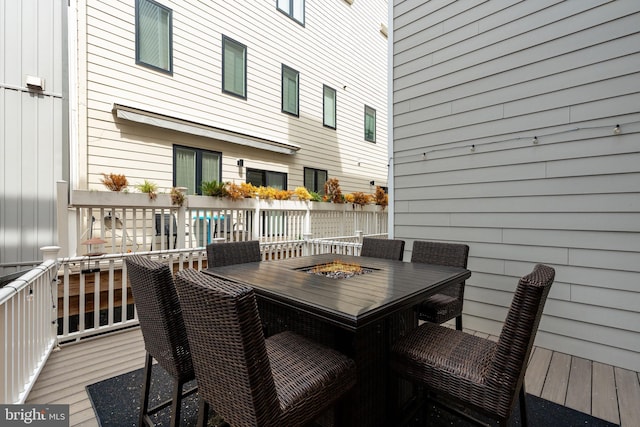 deck featuring a fire pit