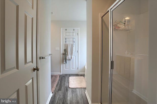 hall featuring hardwood / wood-style flooring