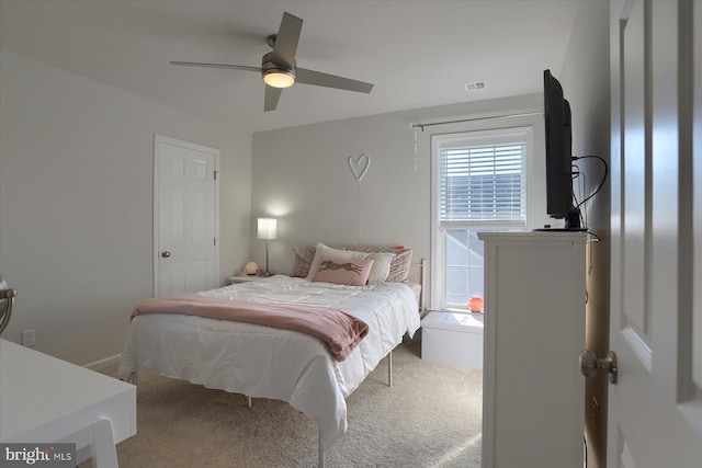 carpeted bedroom featuring ceiling fan