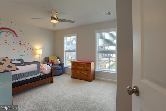 bedroom featuring ceiling fan and carpet floors