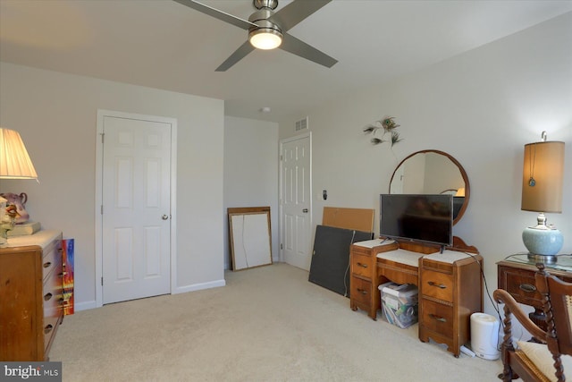 office featuring light colored carpet and ceiling fan