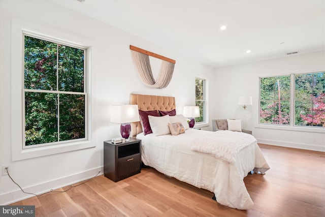 bedroom featuring light wood-type flooring