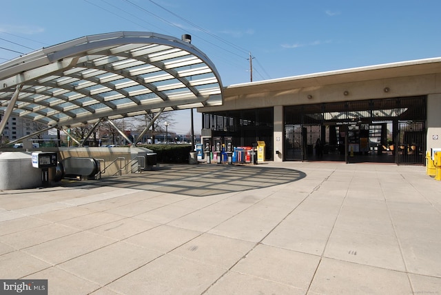 exterior space with a carport