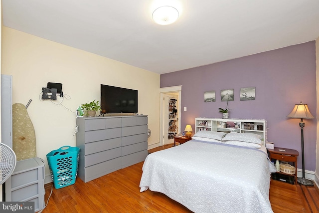 bedroom featuring hardwood / wood-style flooring