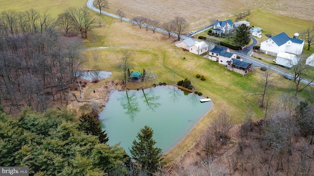 bird's eye view featuring a water view and a rural view