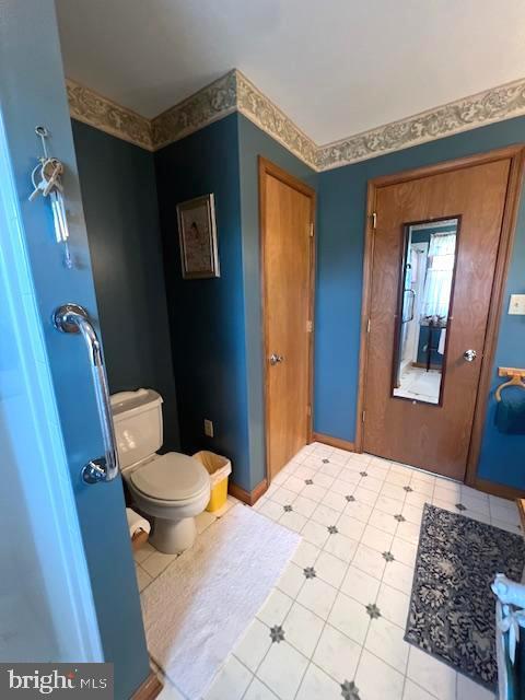 bathroom featuring toilet