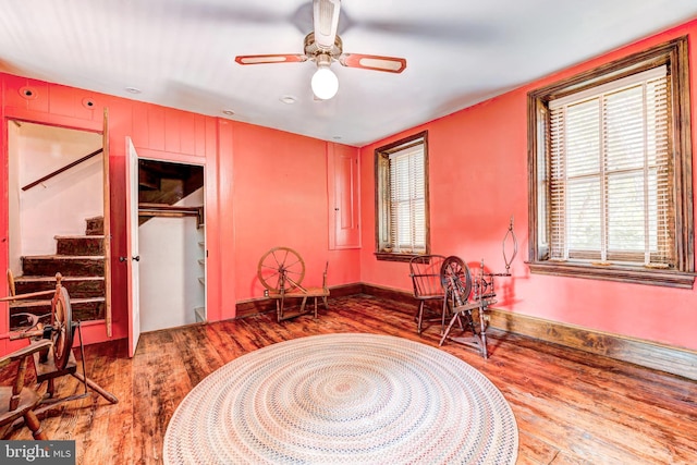 interior space featuring ceiling fan and hardwood / wood-style flooring