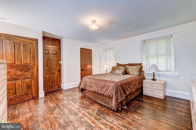 bedroom featuring dark hardwood / wood-style floors