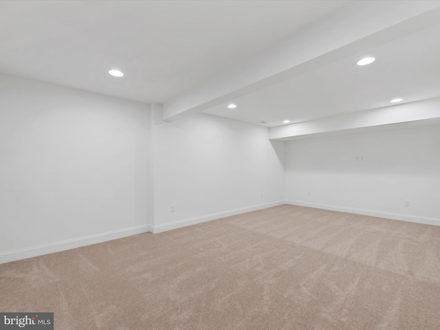 basement with light colored carpet