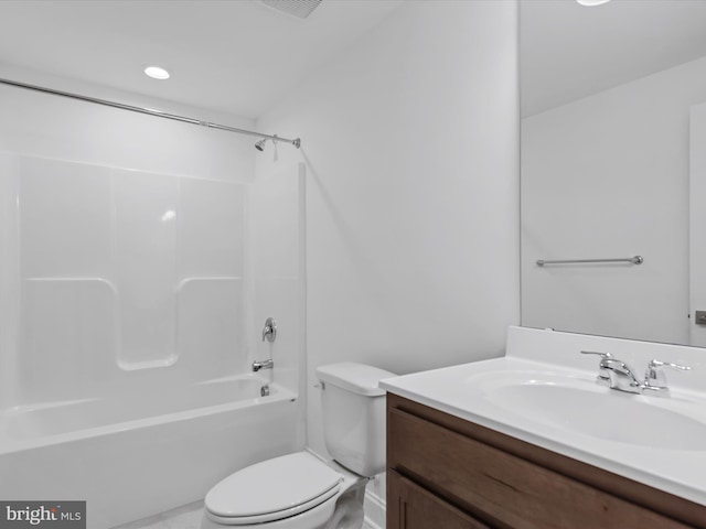 full bathroom featuring vanity, tub / shower combination, and toilet