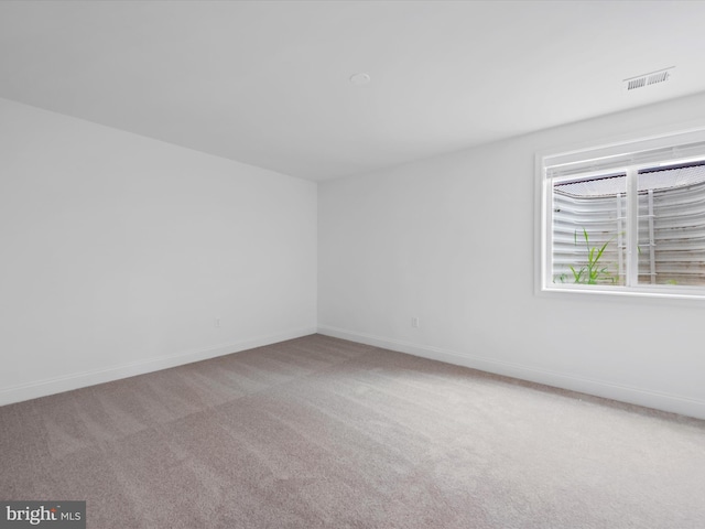 empty room featuring carpet