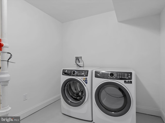 laundry area featuring washer and clothes dryer