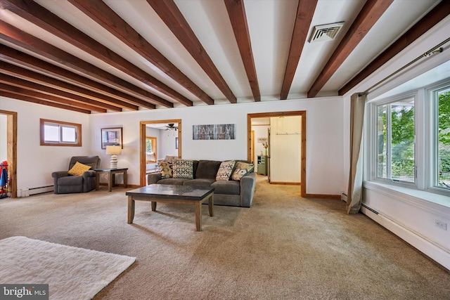 carpeted living room with beamed ceiling and a baseboard radiator