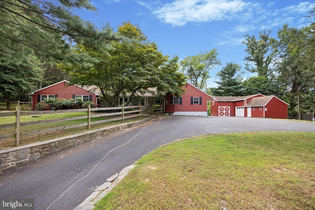 view of front of home with a front lawn