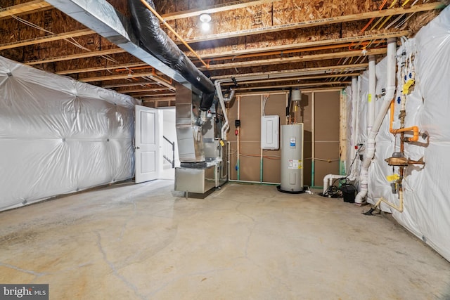 basement featuring electric water heater and heating unit