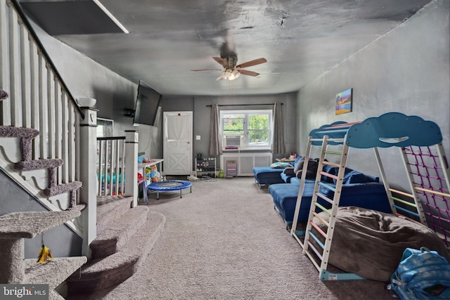 playroom featuring carpet floors and ceiling fan