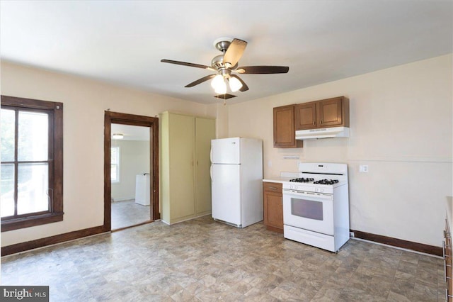 kitchen with ceiling fan and white appliances