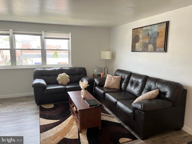 living room featuring light wood-type flooring