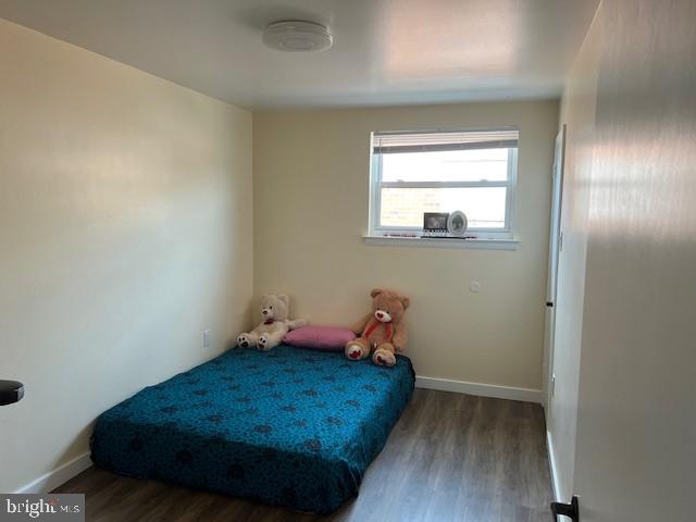 bedroom featuring hardwood / wood-style floors