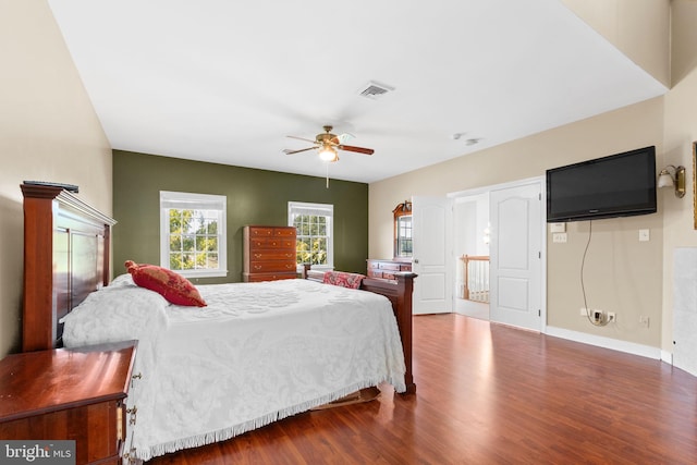 bedroom featuring hardwood / wood-style floors and ceiling fan