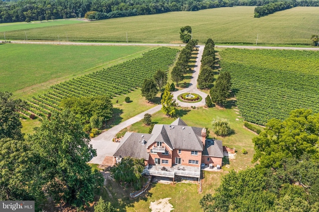 birds eye view of property featuring a rural view