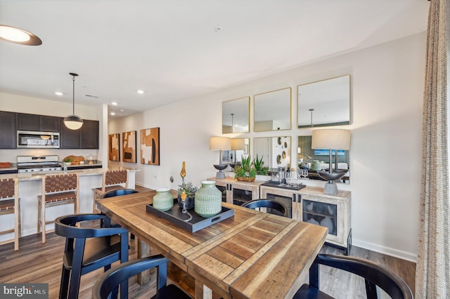 dining room with hardwood / wood-style floors