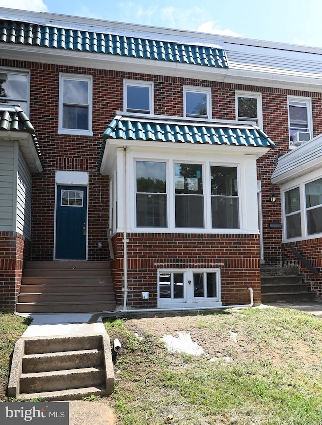 multi unit property featuring brick siding