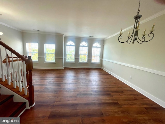 interior space featuring a wealth of natural light, dark wood-type flooring, and ornamental molding