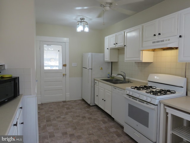 kitchen with sink, ceiling fan, white cabinets, white appliances, and backsplash