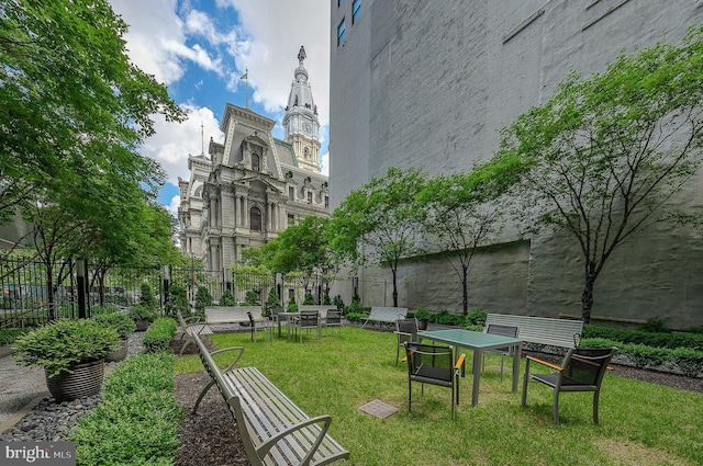 surrounding community featuring a lawn