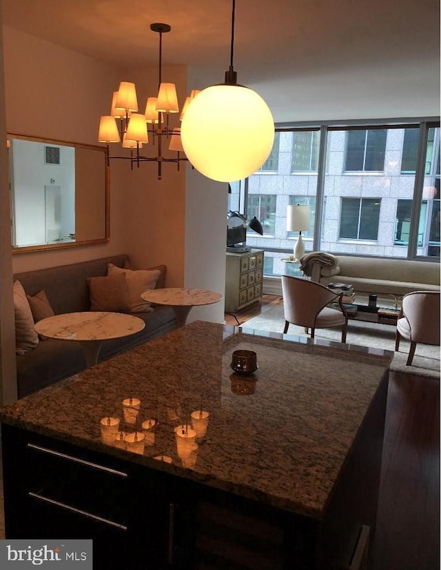 dining space featuring a chandelier