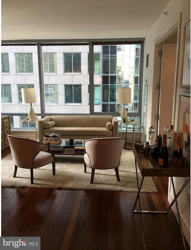 living area featuring hardwood / wood-style floors