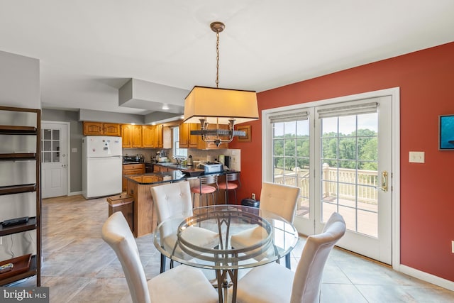 dining space featuring sink