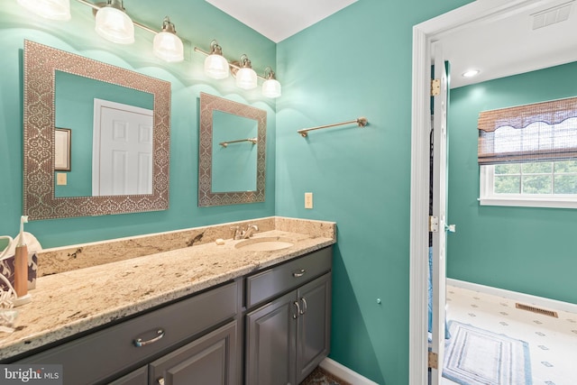 bathroom featuring vanity