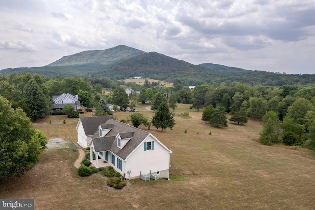 birds eye view of property featuring a mountain view