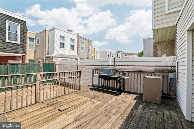 wooden terrace with grilling area