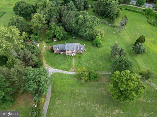 birds eye view of property with a rural view