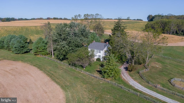 birds eye view of property featuring a rural view