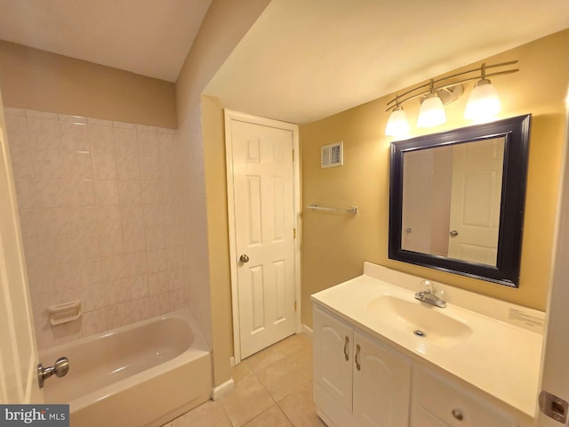 bathroom with vanity, shower / tub combination, and tile patterned floors