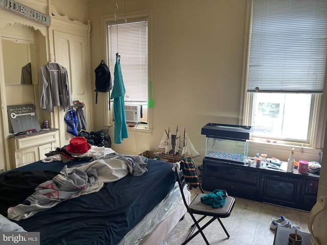 tiled bedroom featuring cooling unit