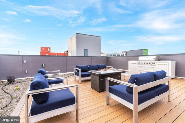 deck featuring a grill and an outdoor hangout area