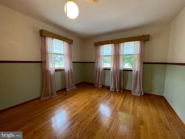 empty room featuring light hardwood / wood-style floors