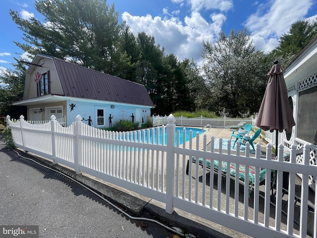 view of pool with a patio area