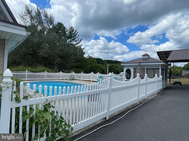 view of pool featuring a gazebo